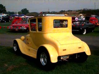 model T coupe called a phone booth>