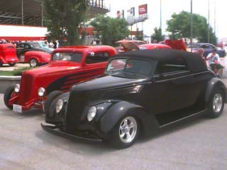 <1937 black Ford convertible>