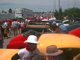 <individual crowds walking around at goodguys rod and custom show in Indianapolis, indiana>